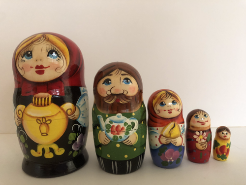 Village girl with Russian kettle nesting doll