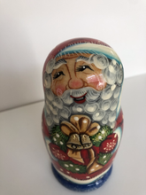 Load image into Gallery viewer, Santa with Christmas Wreath nesting dolls