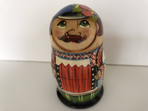 Village Man With Accordion Nesting Doll