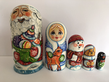 Load image into Gallery viewer, Santa with bag of presents nesting doll