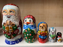 Load image into Gallery viewer, Santa with Christmas Wreath  nesting doll