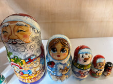 Load image into Gallery viewer, Santa With  Bag of Christmas Presents Nesting Dolls