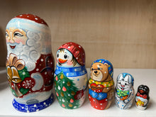 Load image into Gallery viewer, Santa with Christmas Wreath  nesting doll
