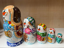 Load image into Gallery viewer, Snowman with Musical Instruments Nesting Dolls